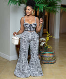 Stylish Black Two-Piece Set with Flared Trousers and Blouse