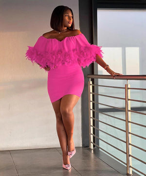 Chic Slim-Fit Dress with Feathered Shoulders and Pixie Wrap Hips