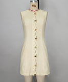 A Slim-Fitting Button-Down Sleeveless Short Skirt in the Style of a Socialite