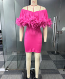 Chic Slim-Fit Dress with Feathered Shoulders and Pixie Wrap Hips