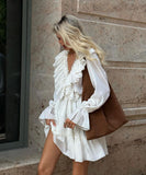 Elegant V-Neck White Dress with Flared Sleeves and Ruffled Details