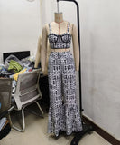 Stylish Black Two-Piece Set with Flared Trousers and Blouse