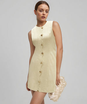 A Slim-Fitting Button-Down Sleeveless Short Skirt in the Style of a Socialite