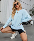 Solid Color Wavy Round Neck Long Sleeve Loose Fitting Shirt