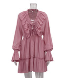 Elegant V-Neck White Dress with Flared Sleeves and Ruffled Details