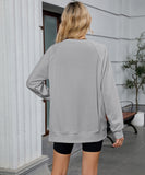 Solid Color Wavy Round Neck Long Sleeve Loose Fitting Shirt