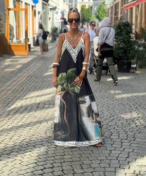 Relaxed Printed Vneck Strap Dress With Wide Skirt Style