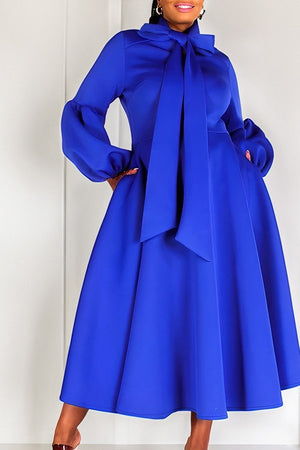 Chic High-Waisted Dress with Statement Puffed Sleeves and Stylish Straps