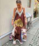 Relaxed Printed Vneck Strap Dress With Wide Skirt Style