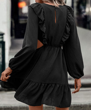 Elegant Black Long-Sleeved Dress with Chic Cutout Waist
